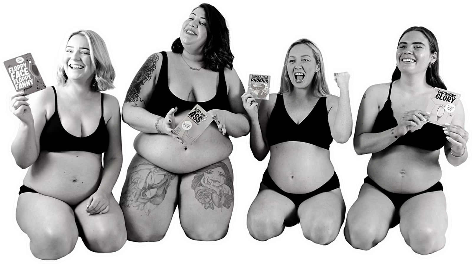 Four pregnant women kneeling together, laughing and holding up Fearless Birth flash cards